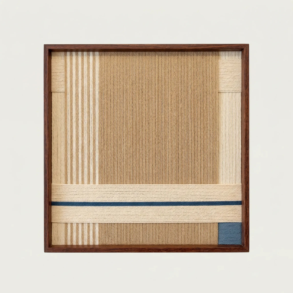 Close-up front view of A Collected Morning soft cotton cord wall art showing the intricate vertical weaving and dark wood frame details.