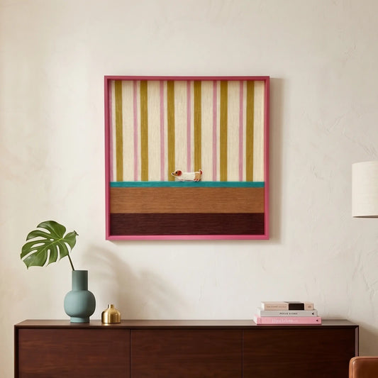 Hand-woven wool wall art featuring a small dachshund motif on pink and yellow stripes hanging above a dark wood sideboard.