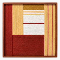Frontal studio shot of the Crimson Daybreak square hand-woven textile wall art featuring crimson red, mustard yellow, and white geometric blocks in a wooden frame.