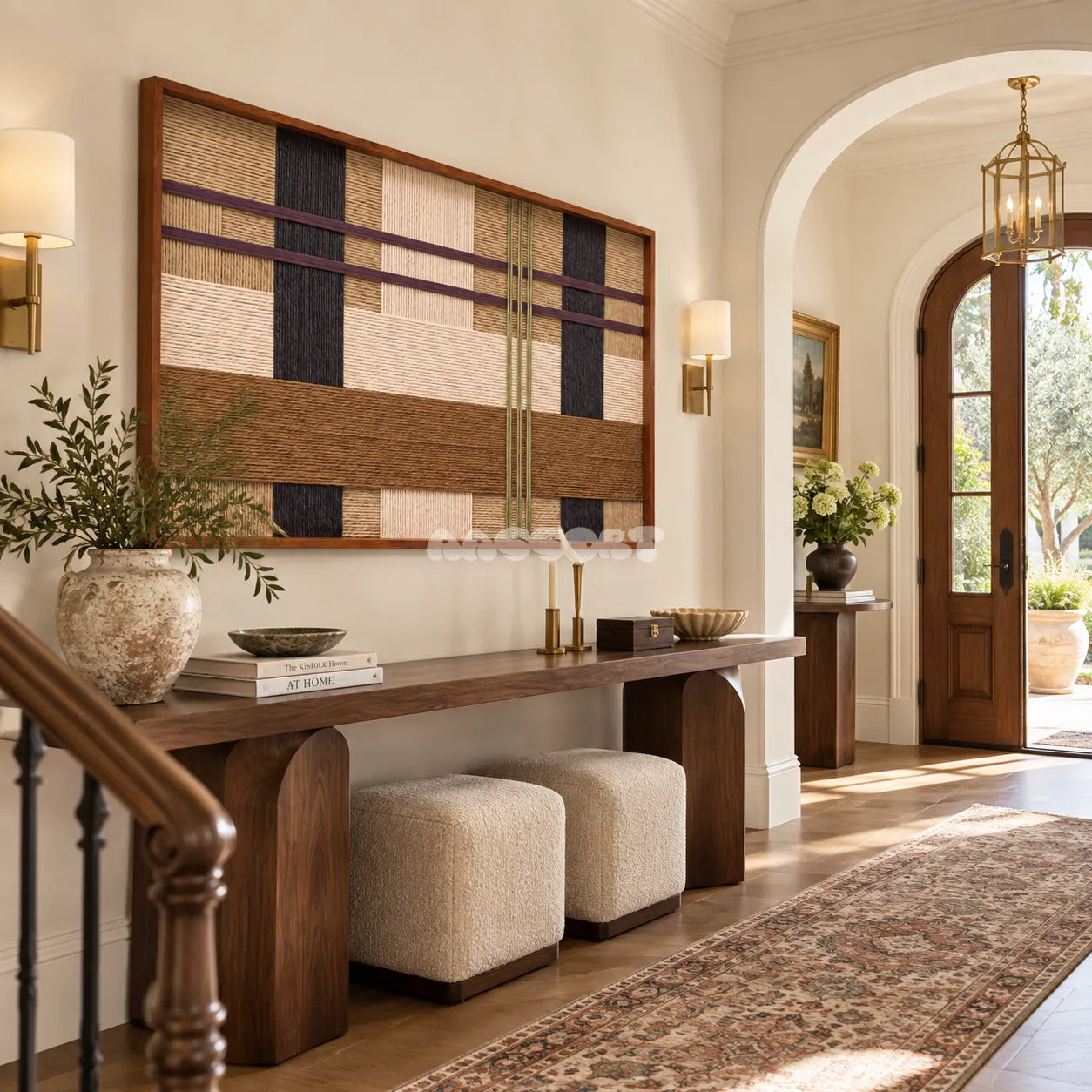 Desert Cadence RE093 geometric fiber wall art displayed above a console in a bright arched entryway