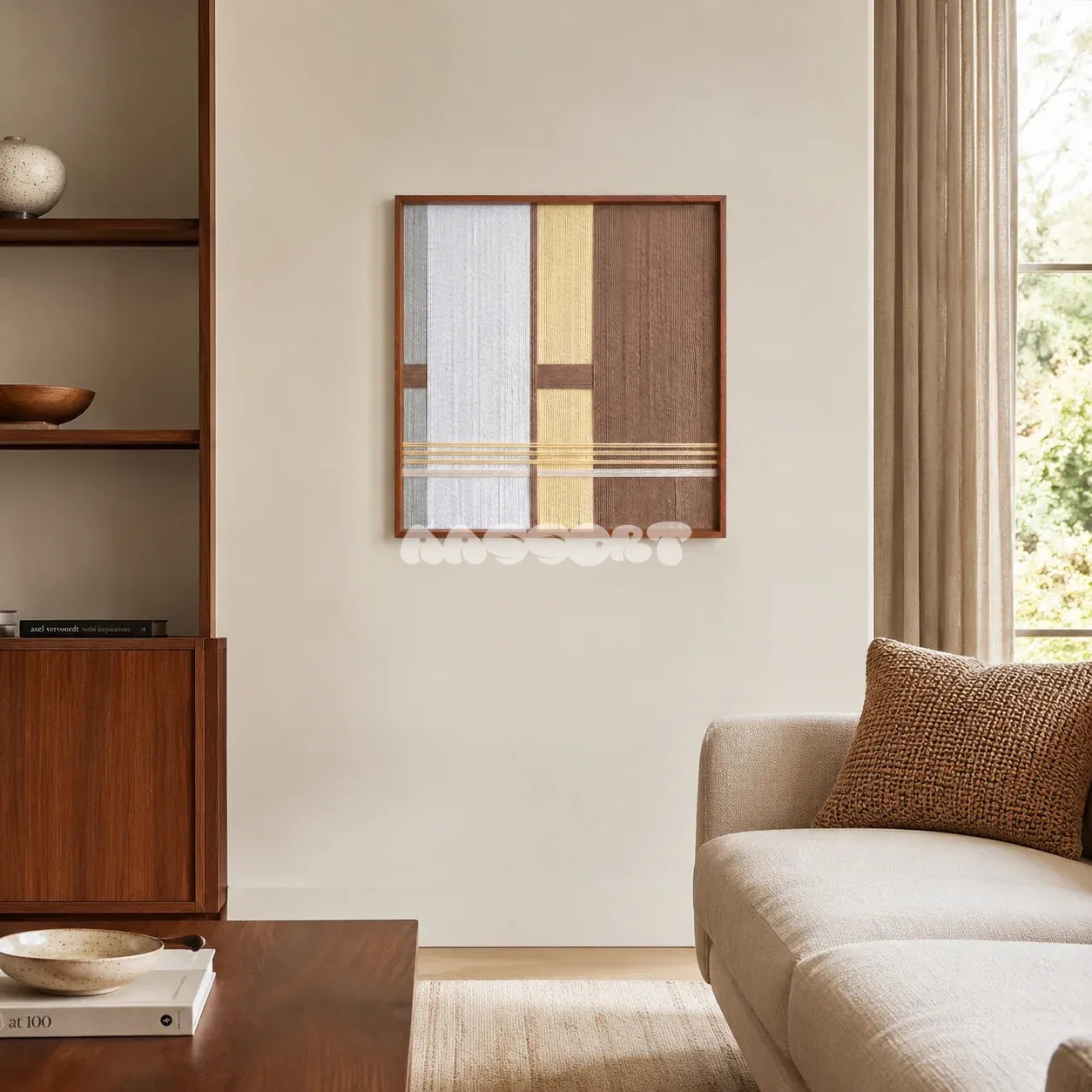 Diluted Solitude gray yellow and brown textile wall art displayed beside built-in shelving in a warm modern living room.