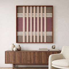 Framed Dusty Tones textile wall art styled elegantly above a wooden credenza in a sunlit modern living room setting.