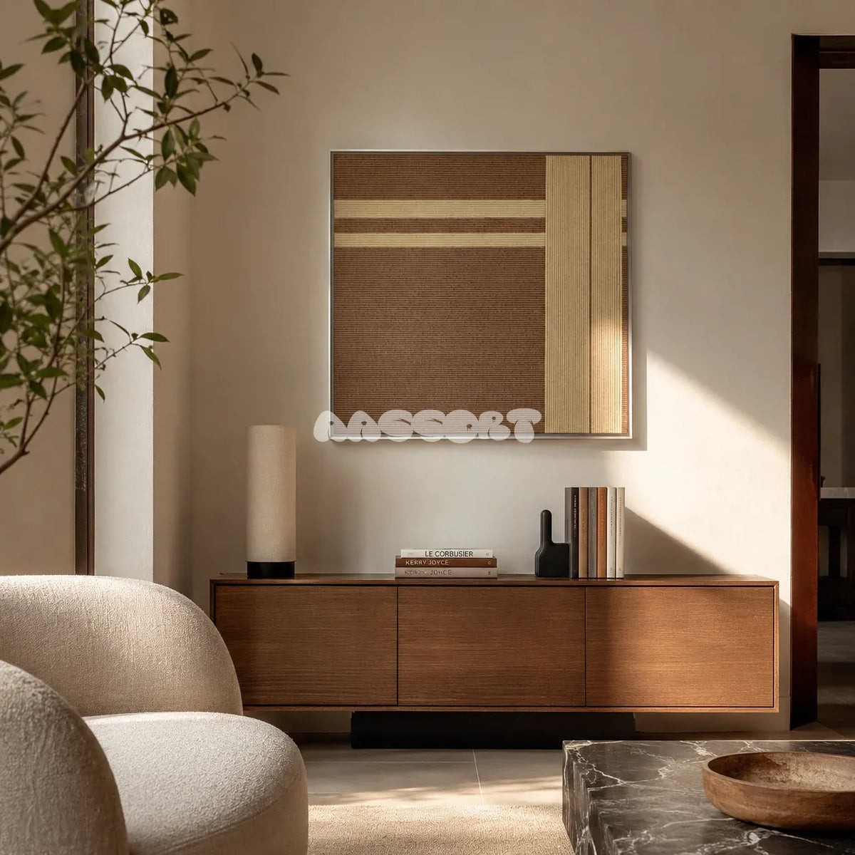 Earth’s Embrace chocolate brown and sand cream geometric yarn wall art displayed above a wood sideboard in a sunlit reading room.