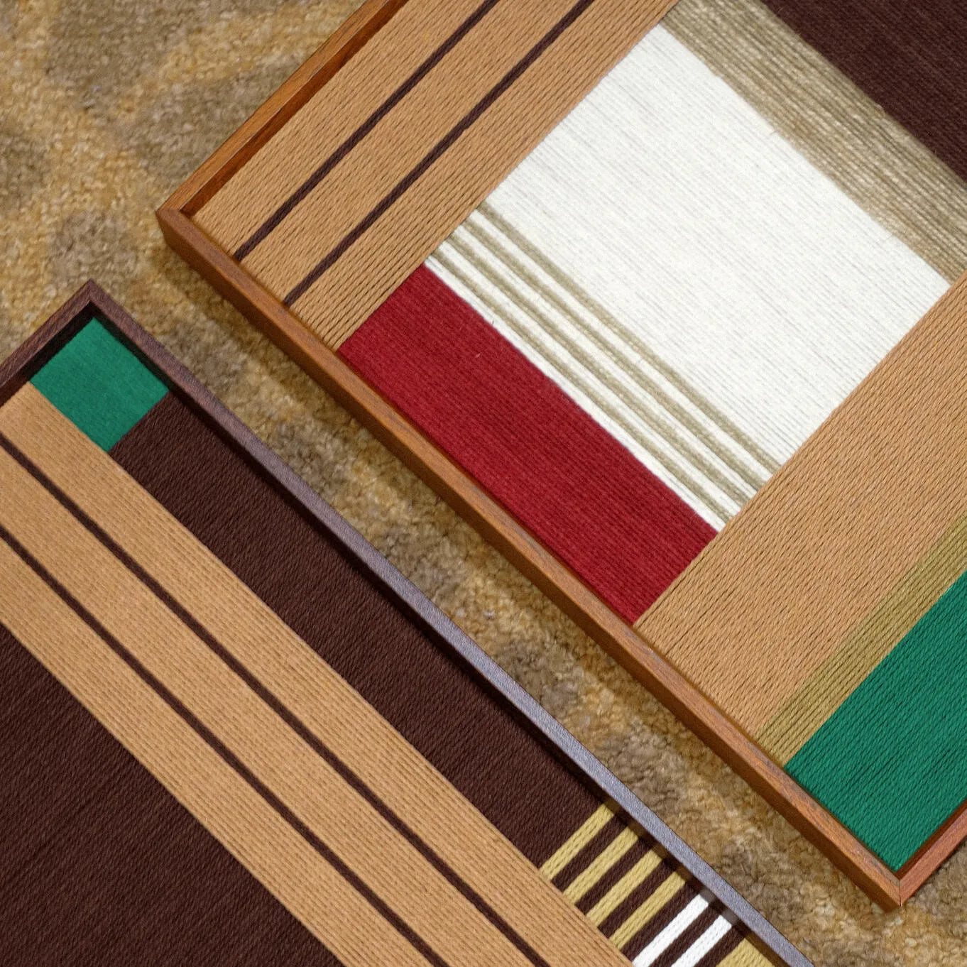 Close-up of Earthy Fragrance wool yarn texture, revealing looped stitching detail and seamless transitions between brown and green yarns
