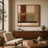 Embers of the Wild earth-tone textile wall art featured above a walnut sideboard in a calm modern living room.