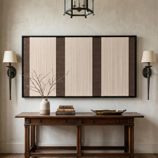 Framed Eternal Colonnade textile wall art styled perfectly above a wooden console table in a warm, inviting hallway with classic wall sconces.