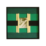Front view of Green Glow yarn woven wall art on a plain white background, showing its exact square proportions and contrasting green stripe pattern
