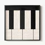 Frontal studio shot of the Little Black Piano square framed wall art featuring a minimalist black and cream geometric tapestry design.