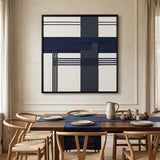 The Midnight Axis textile art provides a striking focal point above a wooden dining table in a sophisticated, minimalist dining room.