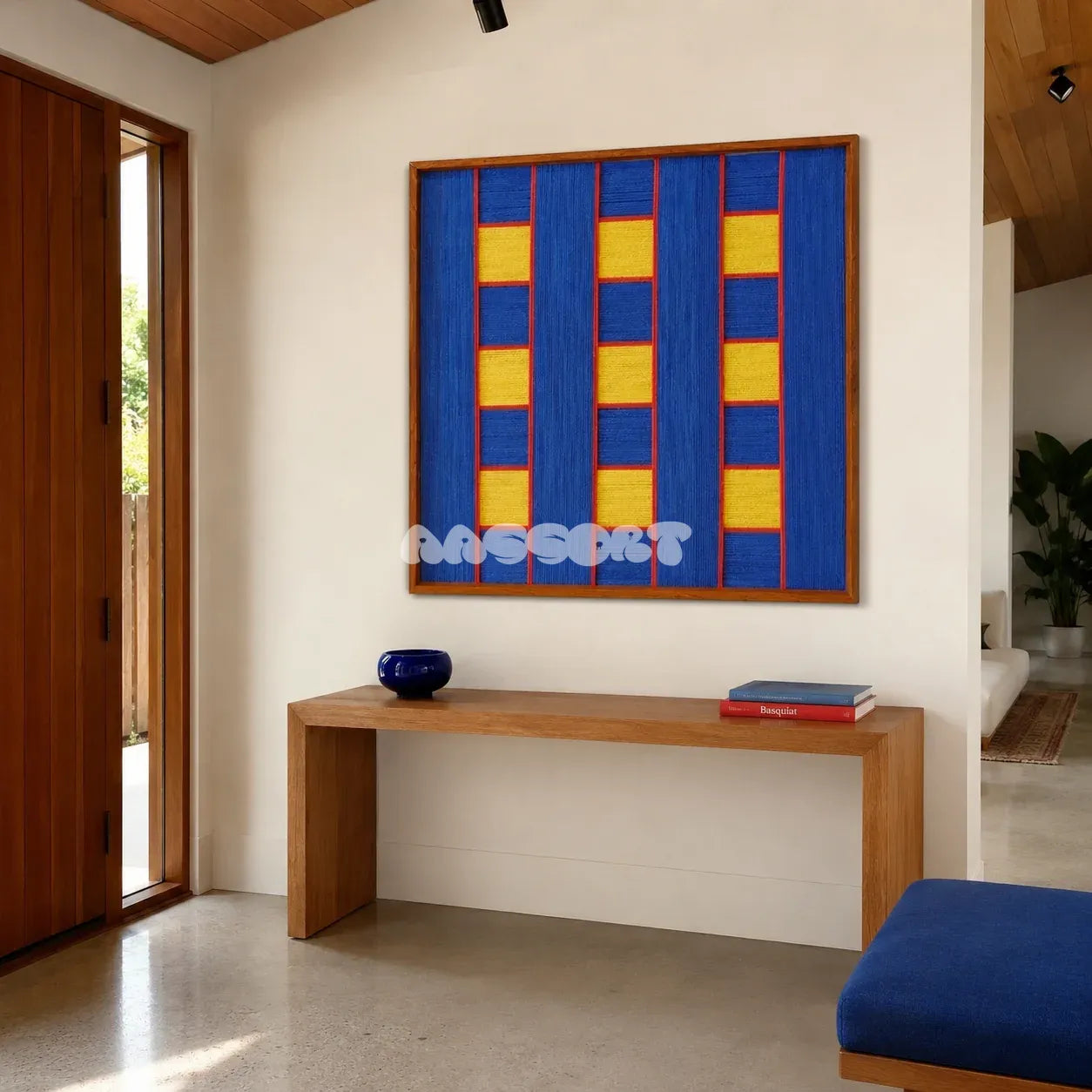 Moonlit Windows blue, yellow, and red geometric yarn wall art displayed above a wood console in a bright modern entryway.