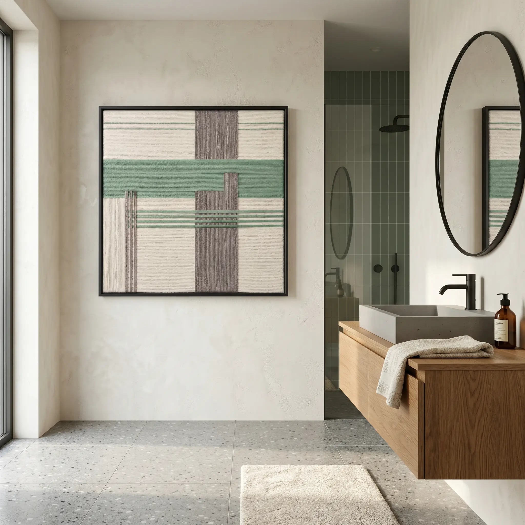 Large square Muted Spring fiber wall art featuring sage green, grey, and cream hand-woven patterns hanging in a modern bathroom with a floating wood vanity.