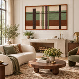 Olive Passage RE091 framed textile art above a stone fireplace in a warm living room with cream and olive seating