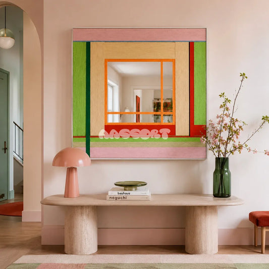 Olive Tree Romance green, blush, beige, orange, and red yarn-framed mirror displayed above a sculptural console in a bright entryway.