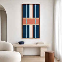 Contemporary lounge interior setting featuring the framed textile art hanging on a neutral wall above a minimalist wooden bench and boucle armchair.