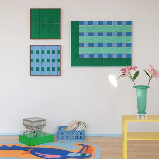 A set of "Endless Summer in Hawaii" textured fiber art pieces arranged on a gallery wall, complementing a vibrant and eclectic room decor style.