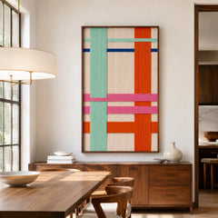 Sophisticated dining room interior showcasing the hand-woven wool tapestry mounted on a textured wall near a modern wooden dining table set and chic pendant lights.