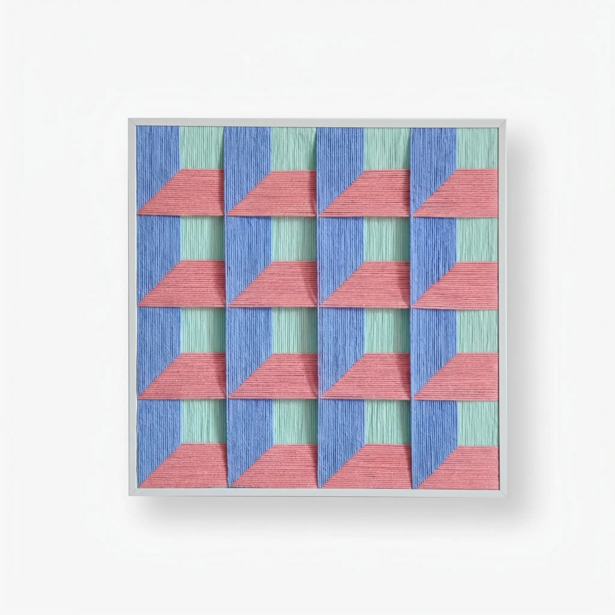 Whispering Bricks framed textile artwork featuring layered pink bands over a precise purple and muted blue triangular pattern.