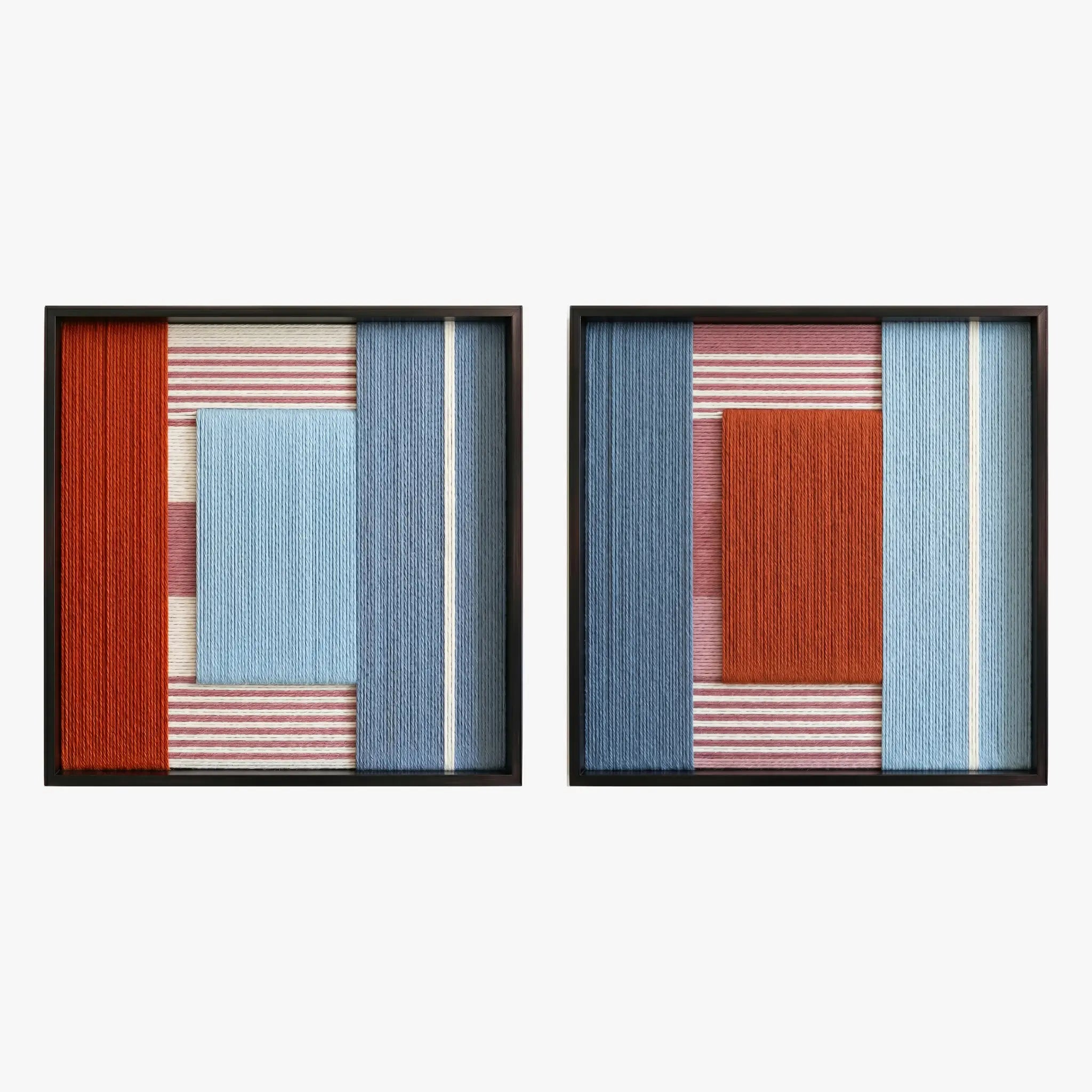 Front studio view of the Cold Fire two-piece textured textile wall art set with red and blue geometric color blocks in black frames on a white background.