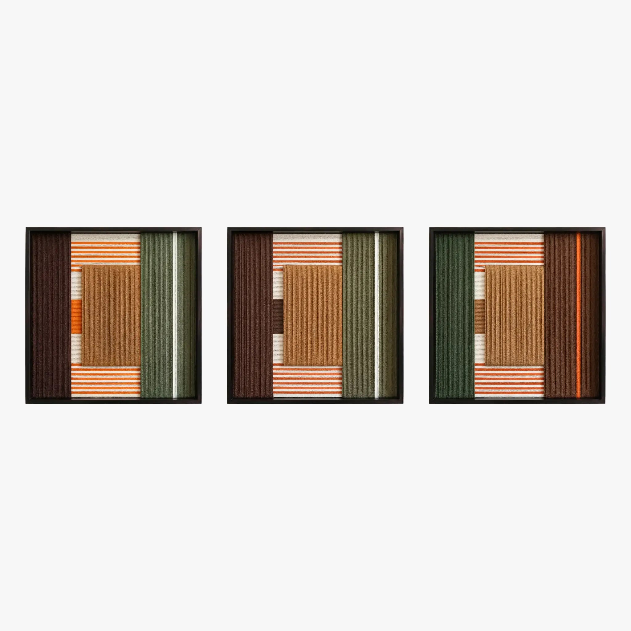 Front studio view of the Sylvan Glow triptych with three square textured wall art pieces in green, tan, rust, and black frames on a white background.