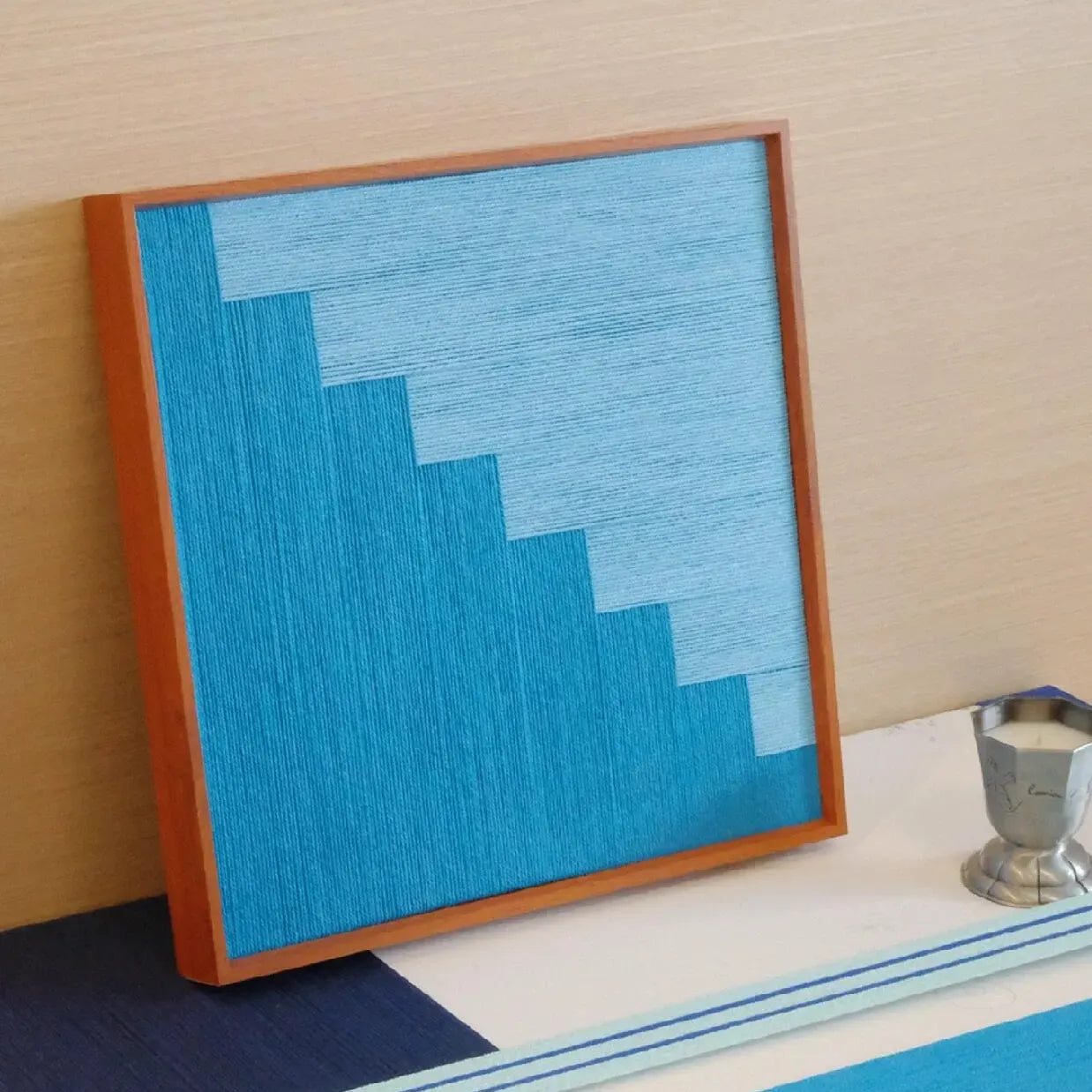 Close-up of the natural wood frame corner on Radiant Azure wall art, emphasizing fine craftsmanship
