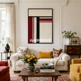 Napoli RE002 framed textile art with crimson red, off-white, and black geometric yarn blocks displayed in a modern interior.