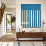 Blue Night RE003 abstract textile artwork with rain-like vertical stripes presented in a peaceful interior.