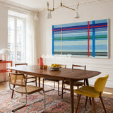 Summer Story RE004 yellow and violet geometric textile wall art styled as a colorful focal point in a contemporary room.