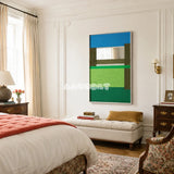 Riverside RE006 framed fiber mirror artwork featuring sky blue, olive, lime, and emerald yarn in a modern home setting.