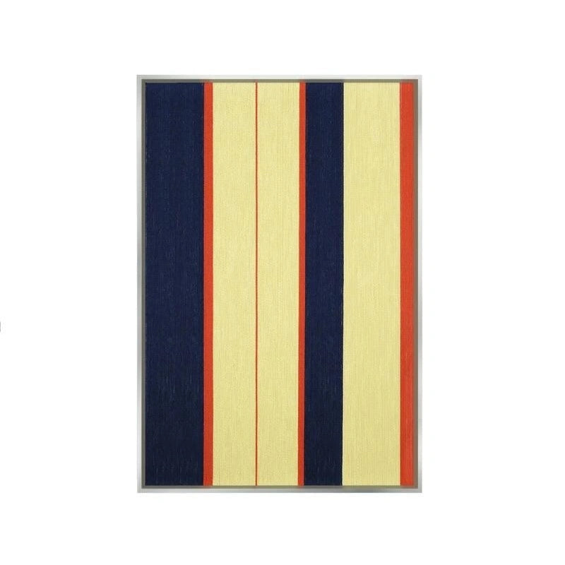 Front view of Twilight Rush RE016 navy, blue, red, and yellow geometric textile wall art in a sleek frame on a white background.