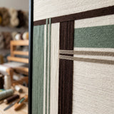 Close-up of Forest Ruins RE022 textile art showing layered sage green, cream, khaki, and espresso soft cotton cord.