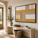 Golden Interval RE030 framed textile wall art displayed above a sleek console in a bright modern entryway.