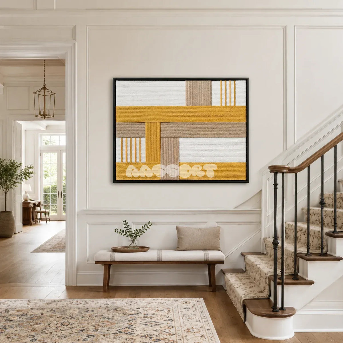 Golden Interval RE030 framed fiber artwork featuring mustard yellow, white, beige, and taupe yarn bands in a modern interior.