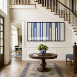 Blue Cadence RE031 blue and ivory textile wall art styled as a crisp coastal focal point in a contemporary room.
