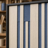 Macro close-up of Blue Cadence RE031 textile art highlighting its textured vertical blue and ivory soft cotton cord.