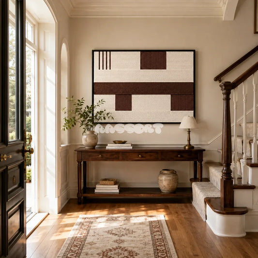 Cocoa Horizon RE032 panoramic framed textile art with cream ivory and cocoa brown geometric yarn displayed in a warm modern interior.