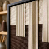 Macro detail of Ivory Loom textured textile art with thick cream and brown yarn texture.