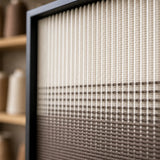 Macro detail of Quiet Thread textured textile art highlighting its softly textured gradient yarn.