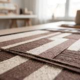 Extreme macro detail of Cocoa Grid textured textile art showing raised brown and cream yarn texture.
