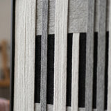 Macro detail of Monochrome Tempo textured textile art highlighting thick black, white, and grey yarn texture.