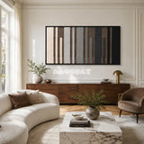 Umber Columns earthy striped textile wall art displayed in a warm contemporary interior.