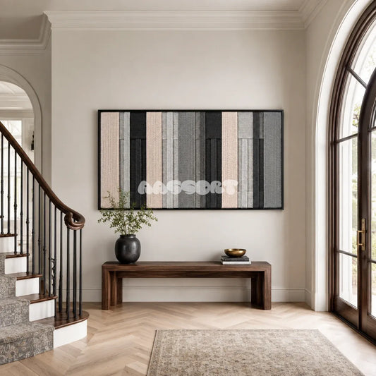 Ivory Structure cream, grey, and black textile wall art displayed in a polished modern interior.