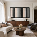 Framed Ivory Structure woven wall hanging with balanced neutral geometric forms in a refined room.