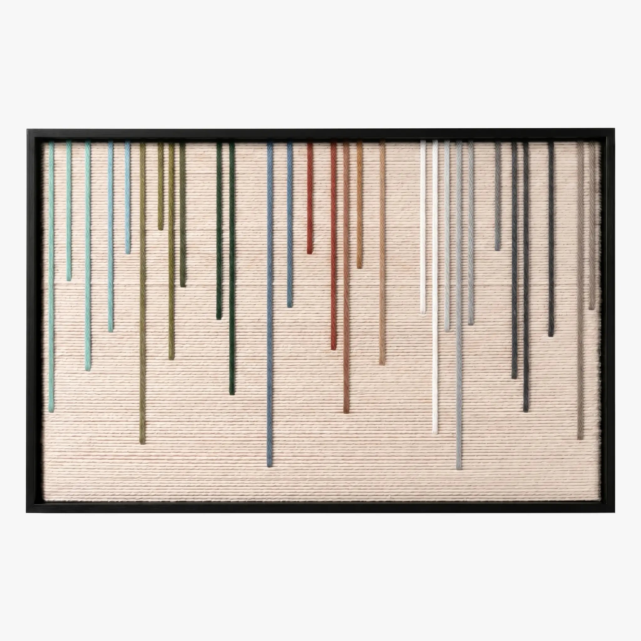 Front studio view of Chromatic Rain textured wall art featuring colorful vertical yarn stripes on a beige background in a black frame.