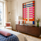 California Rhythm soft cotton cord geometric fiber art displayed in a vibrant contemporary living space.
