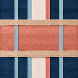 Macro detail of Pittsburgh Prelude textured wall art showing precise navy, light blue, cream, and salmon yarn alignment.
