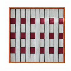 Frontal studio shot of the Ruby Lattice hand-woven wool wall art featuring a grey and burgundy checkerboard pattern in a wood frame against a clean white background.