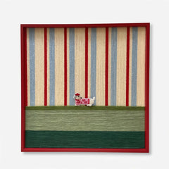 Professional studio shot of the Scarlet Stripe Pup hand-woven wool wall art in a red frame against a white background.