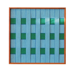 Hand-held view of Seine Riverbank yarn wall art showing its sturdy frame and easy-to-hang compact size
