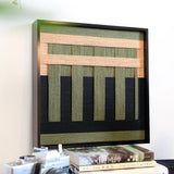 Side profile shot of the black-framed soft cotton cord art, demonstrating the deep shadow box frame and the tactile dimension of the weave.