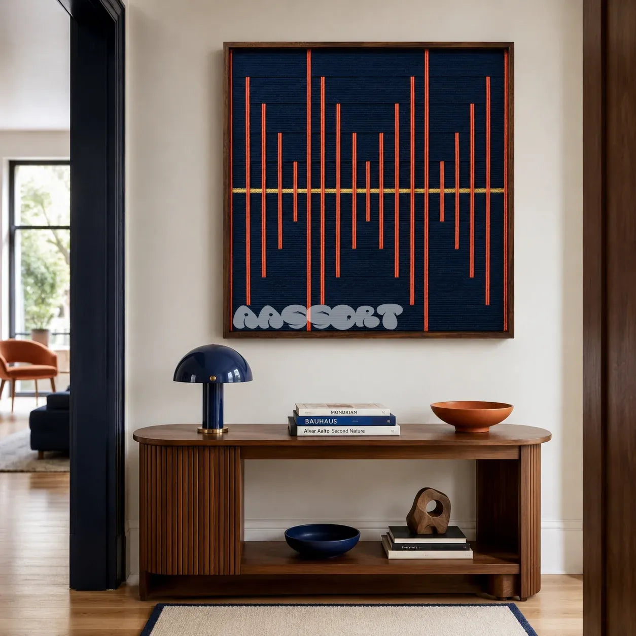 Signal Lost navy and orange textile wall art displayed above a wooden console table in a modern entryway.